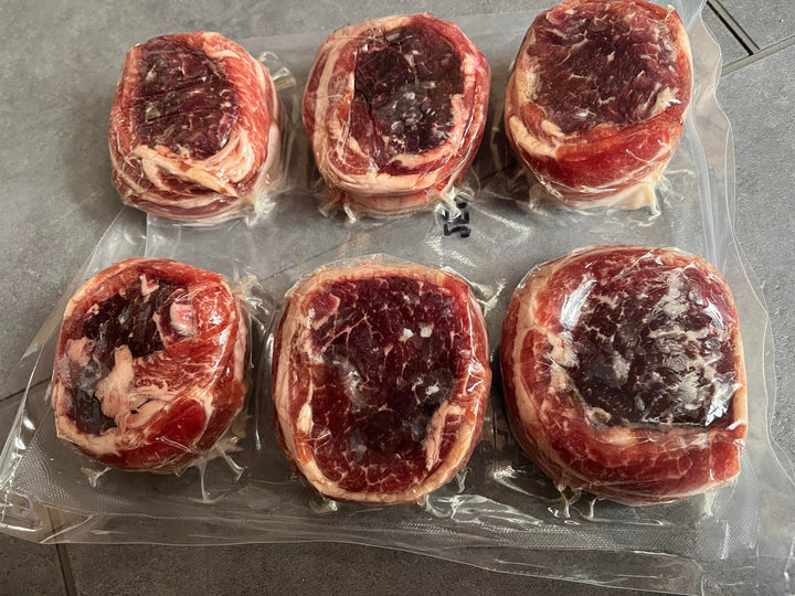 Filet mignon and bacon tournedos