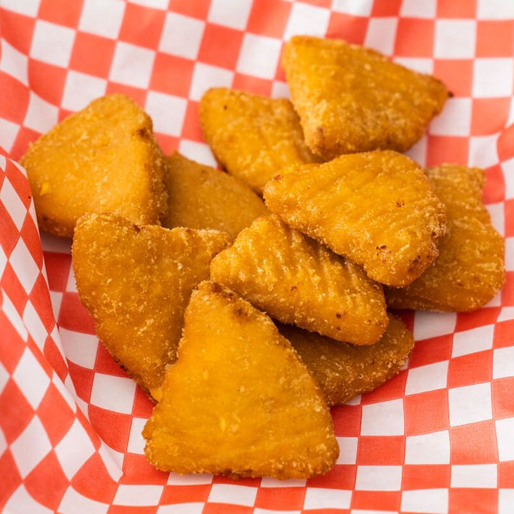 Bouchées de macaroni au fromage cheddar en forme de pointes, proposées par Aliments DKL.